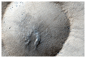 rstidsbunden upptining av en isig krater