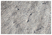 Tafelberge und kleine Aufschttungen innerhalb des Arrhenius Kraters