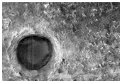 Crater on South Polar Layered Deposits