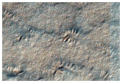 Crater in South Polar Layered Deposits
