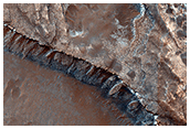 A Channel System and Patterned Ground near Hellas Basin