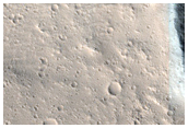Crater in Flow Region in Olympus Mons Aureole