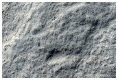 Anomalous Mesa and Exposure of South Polar Layered Deposits