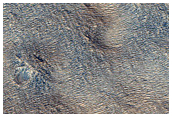 Fan at Terminus of Sinuous Valley