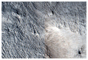Terracing Inside and Outside Degraded Crater Rim