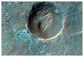 Ancient Bedrock Exposed in Rim of Roddy Crater