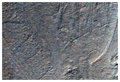 Banded Flow Terrain on Floor of Hellas Planitia