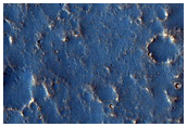 Pits and Troughs in Tempe Terra