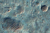 Fans Layers Channels on Floor of Roddy Crater 
