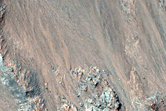Deep and Well-Illuminated Bedrock Exposures in Coprates Chasm
