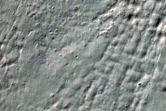 Seasonal Frost Activity and Light-Toned Deposits in Crater

