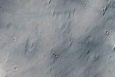 Possible Phyllosilicates in Fluvially Dissected Terrain in Sinus Sabaeus
