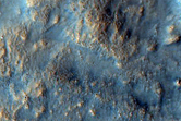 Pits in Crater Ejecta in Northern Arabia Terra
