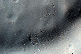 Pointed Crater in Claritas Fossae Region