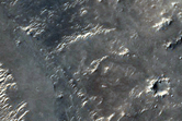 Layers along Valley in Northeast Arabia Terra
