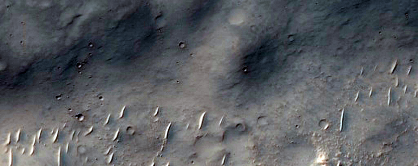 Bakhuysen Crater Ejecta with Mounds and Unit Contacts