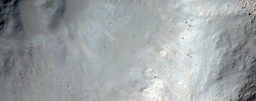 Crater with Rock Outcrop
