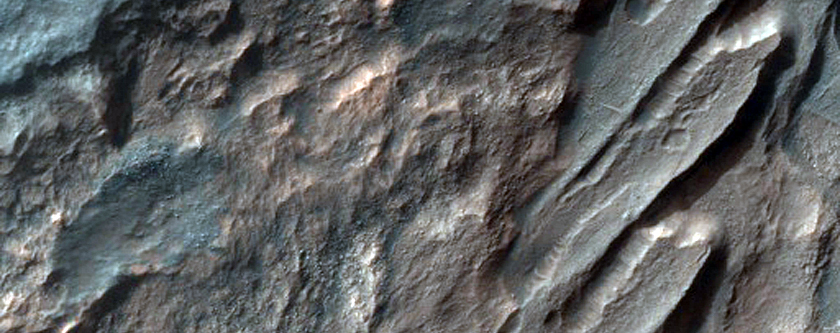 North Hellas Planitia Layered Rock and Parallel Ridge Exposures
