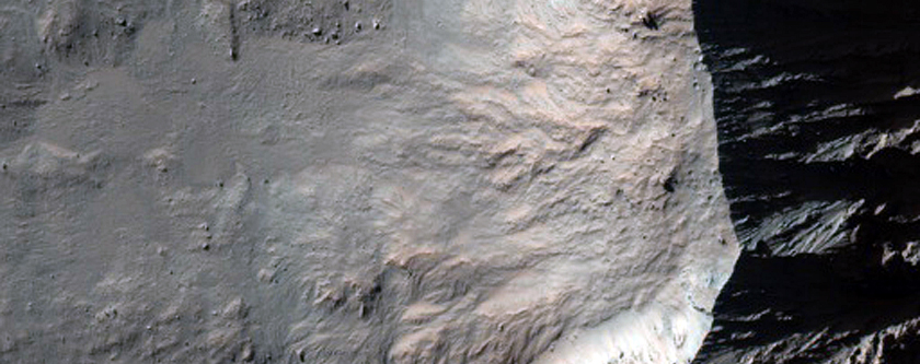 Western Rim and Ejecta of Fresh 8-Kilometer Crater in Margaritifer Terra
