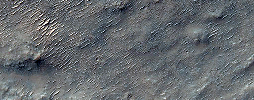 Curvilinear Features on the Floor of Huygens Crater
