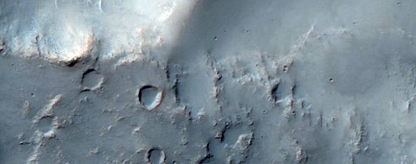 Possible Layered Ejecta Deposits from Bakhuysen Crater
