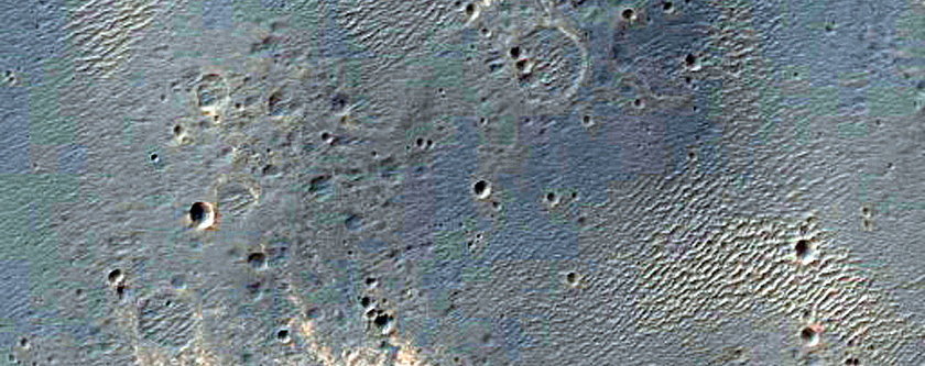 Light-Toned Layered Deposits along Ius Chasma Plateau
