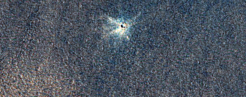 Defrosting Near Icy Crater
