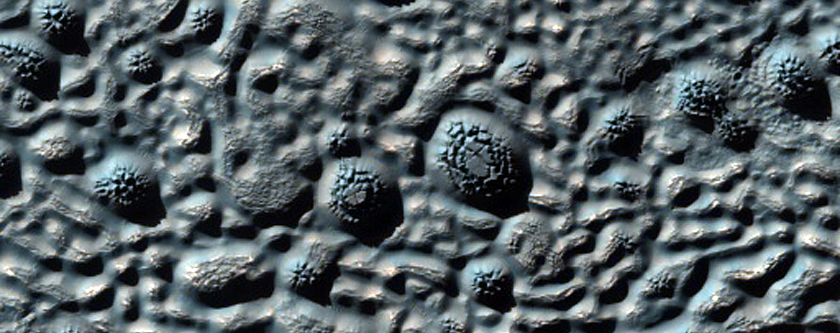 Dark Butte Capping Material in Mid-Latitude Crater Floor
