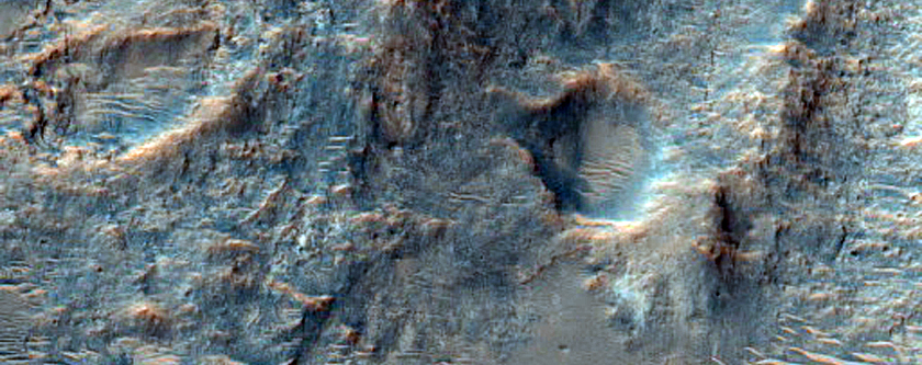 Source Area of Alluvial Fan in Small Crater to the North in Libya Montes
