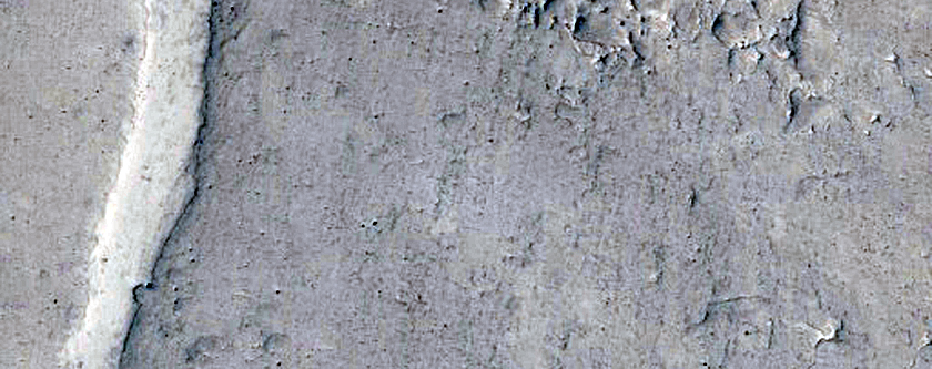 Termini of Two Curvilinear Ridges in Lockyer Crater
