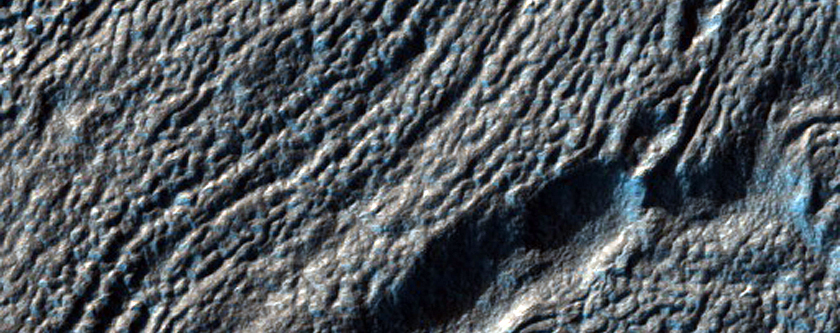 Mid-Latitude Apron and Tongue Materials in Reull Vallis
