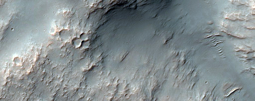 Wrinkle Ridge and Channel Intersection along Huygens Crater Rim
