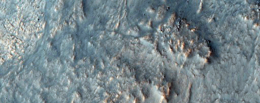 Fractures and Exposed Bedrock in Lyot Crater

