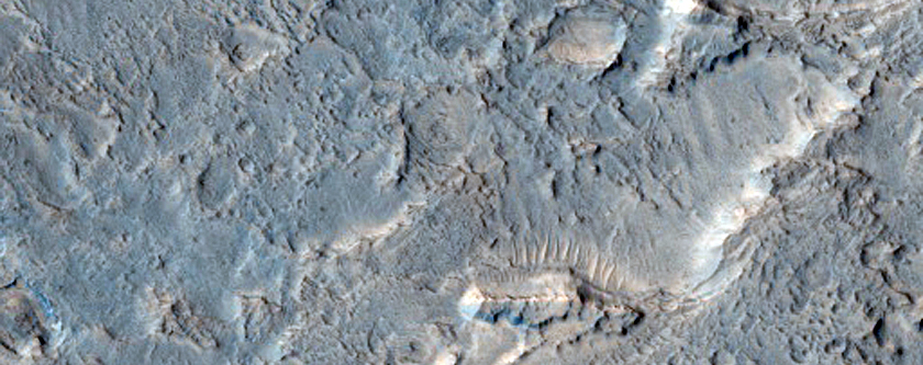 Butte and Mesa Forming Crater Fill in CTX Image
