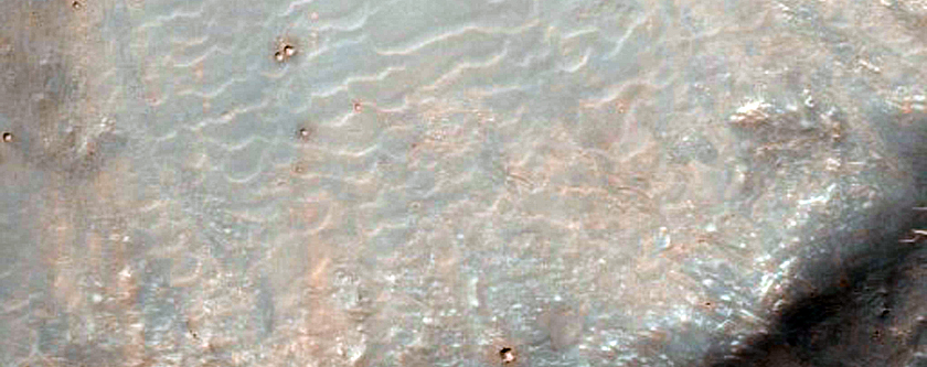 Crater with Thin Ejecta in Sinai Planum
