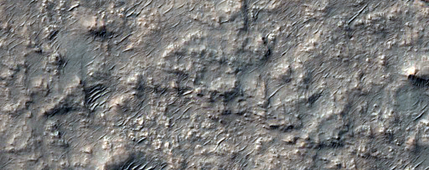 Bedrock Exposures and Possible Chlorides in Terra Cimmeria

