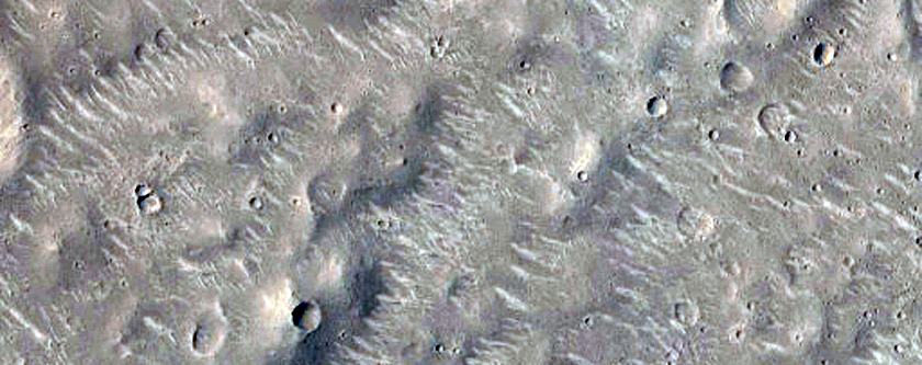 Well-Preserved Impact Crater with Central Pit
