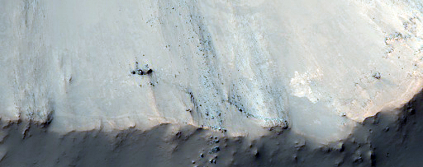 3-Kilometer Crater in Thermophysically Unique Bakhuysen Crater Ejecta
