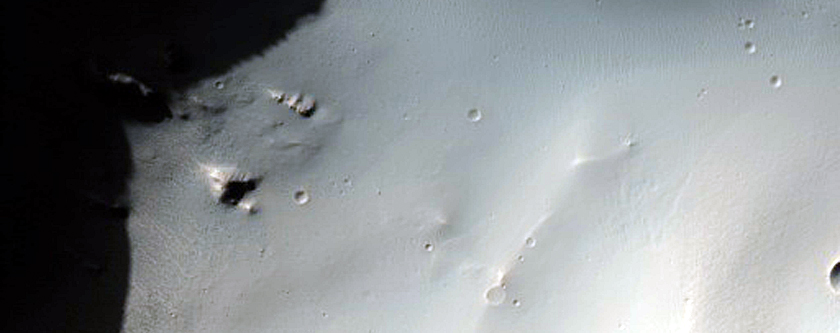 Rim and Ejecta of Well-Preserved Impact Crater
