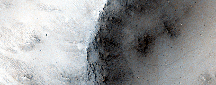 Ejecta Ramparts with Strong Nighttime Thermal Anomaly
