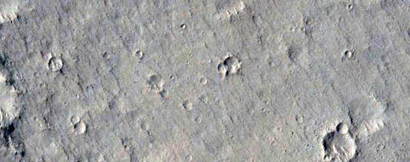 Mesa and Exhumed Crater in Northern Amazonis Planitia
