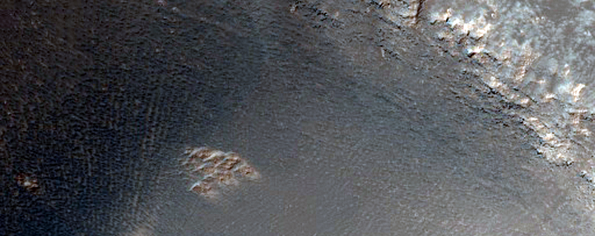 Pit in Southeastern Syria Planum
