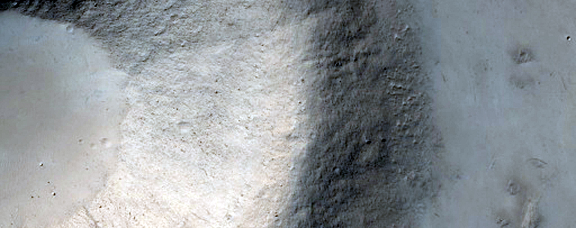 Small Crater Exposing Subsurface
