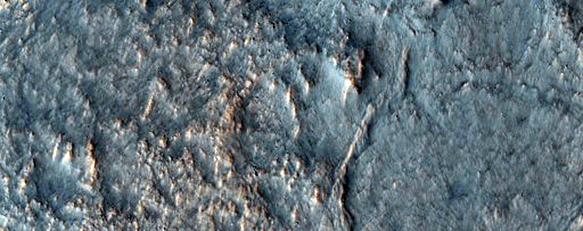 Fractures and Exposed Bedrock in Lyot Crater

