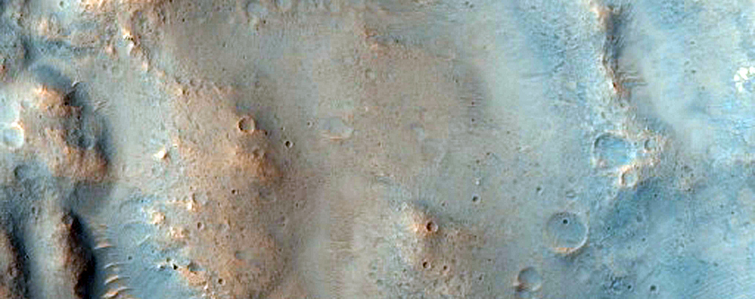 Poona Crater Ejecta Spilling into Kasei Valles
