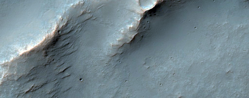 Wrinkle Ridge and Channel Intersection along Huygens Crater Rim
