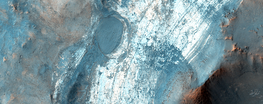 Eroded Infill or Uplift within Degraded Crater in Nili Fossae Region
