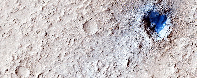 Wind-Streaked Crater in Marte Vallis
