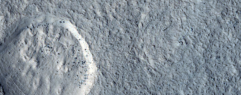 Glacial Ridges Near Mound in Moreux Crater
