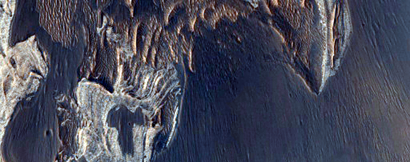 Stratified Material in Tithonium Chasma